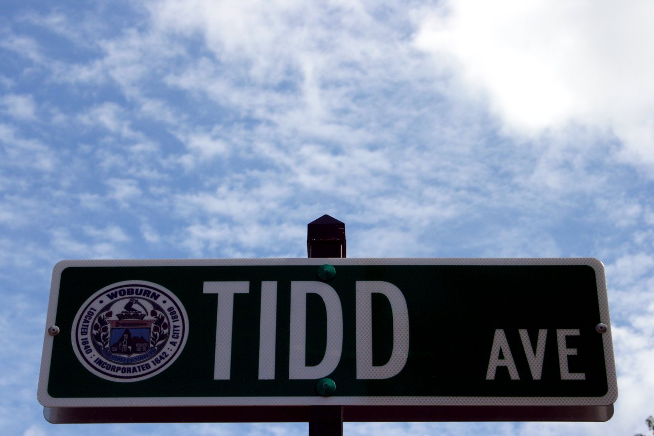 A street sign reading Tidd Ave in Woburn, Massachusetts